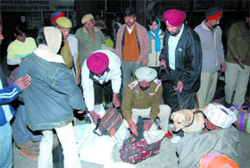 Security personnel carrying out checking at Bathinda railway station on Monday night. The security agencies, however, termed it as a routine exercise. However, it assumed significance following the car bomb blast that rocked New Delhi besides injuring a foreign diplomat on Monday evening.