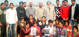 Students of Guru Ram Das Institute of Engineering and Technology praying for good health of Yuvraj Singh on Monday.