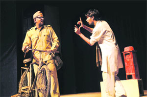 Artistes in a scene from the play ‘Letter to God’ at Panjab Kala Bhavan, Sector 16, Chandigarh, on Monday.