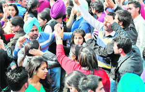 Students at a dance party in connection with Valentines Day celebrations at Student Centre, Panjab University, Chandigarh, on Monday. 