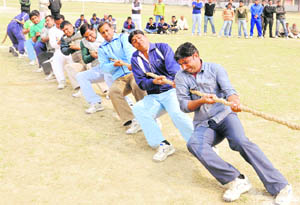 Sportspersons participate in a tug-of-war game on the concluding day of the district-level Gramin Panchayati Raj Games at Karan Stadium in Karnal on Monday.