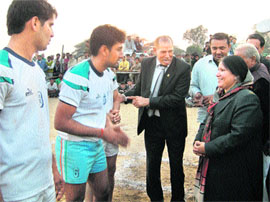 Education Minister Geeta Bhukkal interacts with kabaddi players during an Open Sports Competition at Matanhale village in Jhajjar.