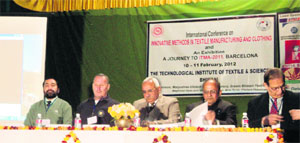 Dignitaries share the dais during an international conference on Innovative Methods in Textile Manufacturing and Clothing in Bhiwani. 