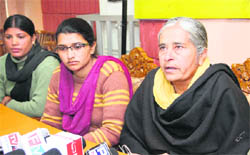 Members of the Istri Jagriti Manch address a press conference in Jalandhar on Monday. 