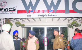 Police officials outside the WWICS office in Phase VI of Mohali on Tuesday.