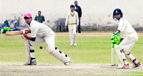 A batsman plays a shot during the Coca Cola Cricket Cup at DAV School in Sector 8, Chandigarh, on Tuesday.