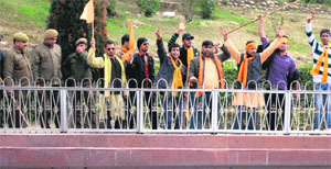 Activists of the Bajrang Dal protest against the Valentines Day celebrations at Bage Bahu Park in Jammu on Tuesday