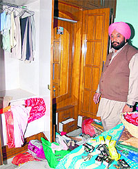 A man shows the ransacked house in Ekta Nagar, Jalandhar, on Tuesday