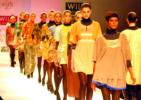 Models display the creation by designer Vineet Bahl during the 1st day of Wills Lifestyle Fashion Week-Autumn Winter 2012, at Pragati Maidan in New Delhi on Wednesday.