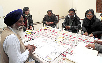 Architecture students of Guru Nanak Dev University, Amritsar, with a member of the management of the Gurdwara Sri Darbar Sahib in Muktsar. 