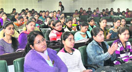 Students of HMV College participate in a seminar on cancer awareness in Jalandhar on Wednesday. 