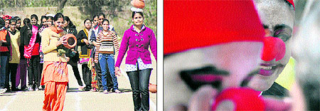 Girls take part in a handi race; a participant tries to fix her artificial nose