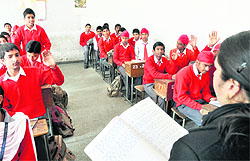 Students attend a lecture in a class in Ludhiana