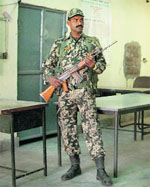 A policeman outside a strongroom at Dera Bassi