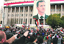 Syrians rally in support of President Bashar al-Assad in central Damascus