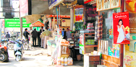 With the footpaths encroached upon by shopkeepers.