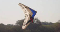 A participant of the Army hang-gliding team takes off on Thursday at Sriganganagar in a bid to create a world record.