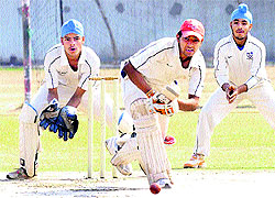 A batsman plays a shot in a match of Coca Cola Cup in Chandigarh on Thursday
