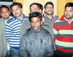 The chain snatcher, who was caught by the Uttarakhand police, being presented before mediapersons in Dehradun on Thursday