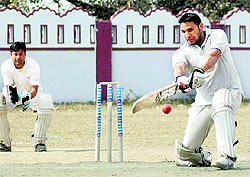 A batsman in action in a match in the 60th district cricket league played in Dehradun on Thursday