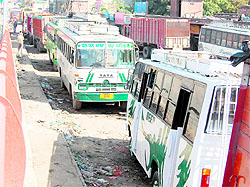 Trucks parked under the flyover from Ram Talai to the Galiara parking cause hindrance in the smooth flow of traffic in Amritsar