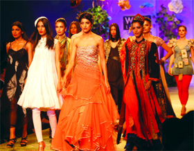Models walk the ramp during a special show You can free us at the Wills Lifestyle India Fashion Week in New Delhi on Friday.