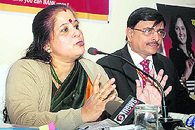Usha Anantha Subramanian, Executive-Director of the Punjab National Bank, addresses a press conference in Dehradun on Friday.