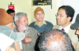 A BSP delegation presents a memorandum to Deputy Commissioner Amit Aggarwal against atrocities on Dalits in Hisar on Friday.