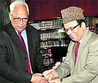 Finance Minister Abdul Rahim Rather calls on Governor NN Vohra at Raj Bhawan in Jammu on Friday