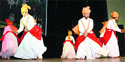 Artistes present a Dogri dance during the folk festival at Abhinav Theatre in Jammu