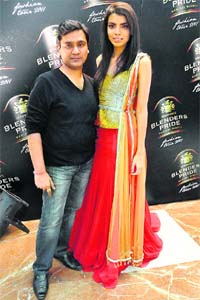 Raakesh Agarwal poses with a model