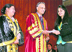 SK Goyal, Chairman of the Central Board of Excise and Customs, New Delhi, gives away an award during the annual prize distribution function at the SCD Government College in Ludhiana on Saturday