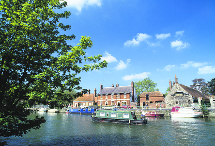 After a little while, one adjusts to the gentle pace and begins to appreciate the landscape and the 200-year-old waterway architecture floating past the boat