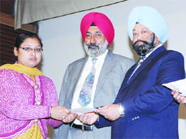 University registrar Dr Inderjit Singh gave away the scholarships to students.