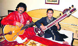 Salil Bhatt performs along with his cousin Ankit Bhatt in Amritsar on Sunday. 