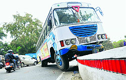 The bus perched at the roundabout in Sector 38 of Chandigarh on Sunday