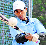 Seema of Panjab University plays a shot during her match in the softball championship in Chandigarh on Sunday