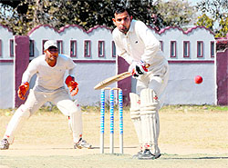 A batsman in action in a match in the 60th Dehradun District Cricket League in Dehradun on Sunday