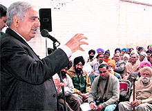 PDP patron and former Chief Minister Mufti Mohammad Sayeed addresses a rally in the Simbal area of RS Pura on Sunday