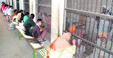 Friends and relatives meet prisoners in the visitors zone inside the Patiala Central Jail. 