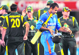 Irfan Pathan leaves the field after being dismissed during the tri-series ODI against Australia in Brisbane on Sunday. Australia won the match by 110 runs.