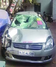 The damaged car parked at a police station in New Delhi on Monday