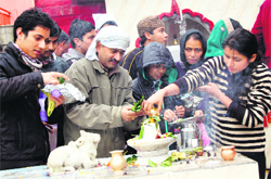 Devotees pray on the occasion of Mahashivratri at Khaniyara near Dharamsala