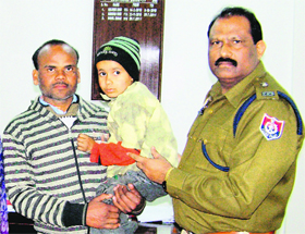 Recovered Nisha being handed over to her father in Ludhiana.