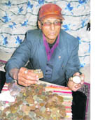 Ram Parkash shows rare coins, Egyptian President Jamal Abdel Nassers gas lighter and a rare pocket watch. 