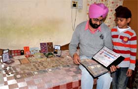 Amrik Singh along with his collection at his residence on the Bibiwala road in Bathinda on Tuesday