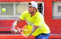 Saketh Myneni of India returns a shot during the ITF Mens Circuit at the CLTA on Tuesday. 