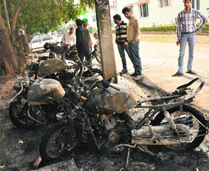 The motorcycles that were burnt at Chandigarh in the wee hours on Tuesday.