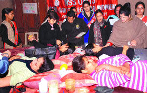 Students donate blood at a camp organised by the NSS unit and the Red Ribbon Club of MCM DVA College in the college in Chandigarh on Tuesday.