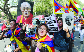 Exiled Tibetan DU students take out a protest march against the ongoing crisis in Tibet and call upon China to respect human rights in Tibet, in New Delhi on Tuesday.
